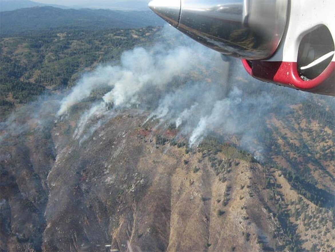 The Springs Fire is is about two miles east of Banks along Highway 17. Photo via InciWeb